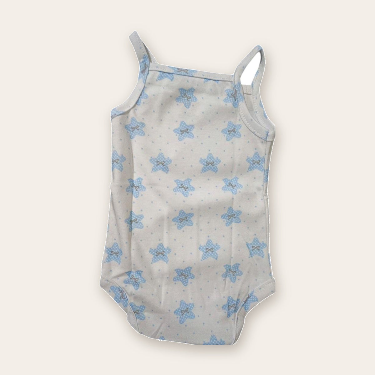 Strappy Printed Baby Bodysuit – White / Stars – front, styled