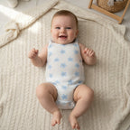 Strappy Printed Baby Bodysuit – White / Stars – styled on baby