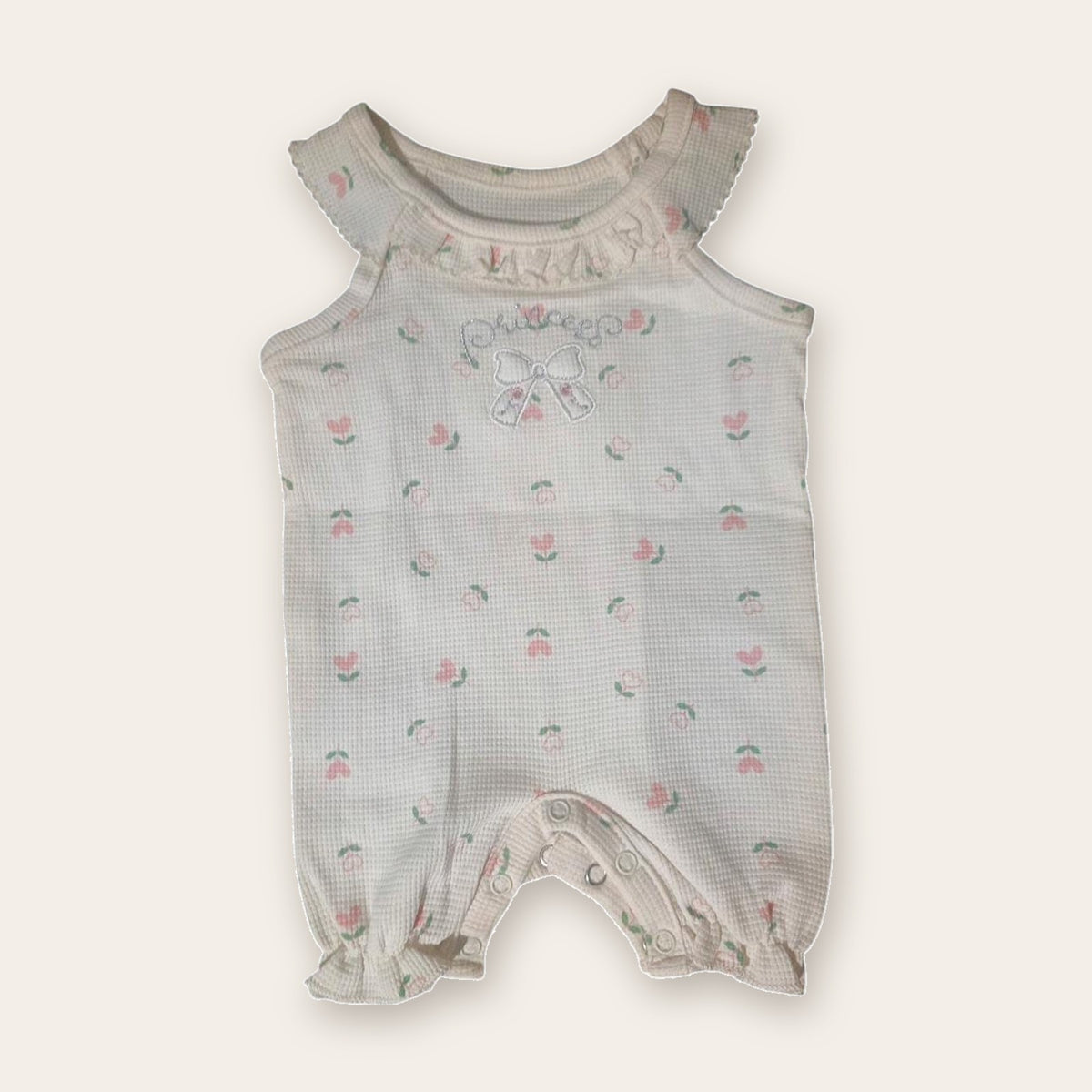 Flutter-Sleeve Waffle Baby Romper – White / Tulips – front, styled