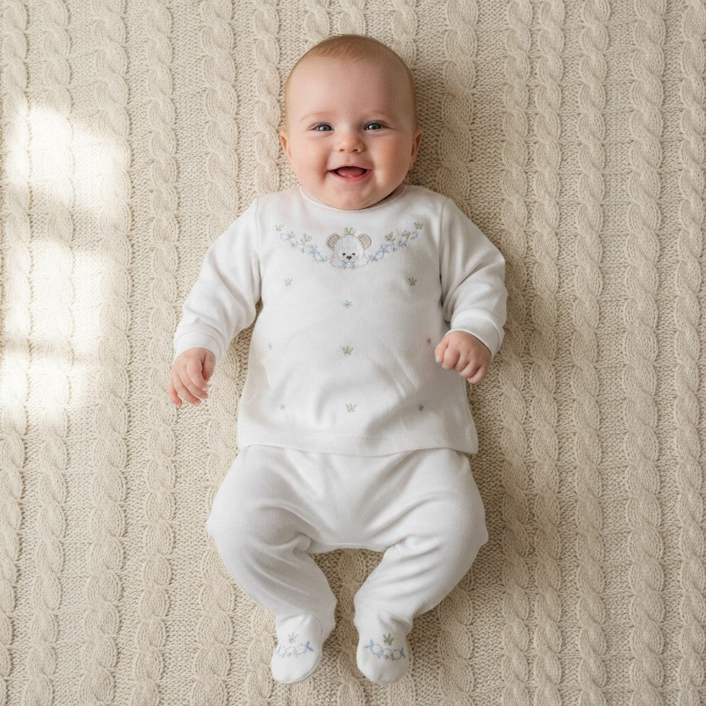 Baby wearing white embroidered teddy 2-piece set