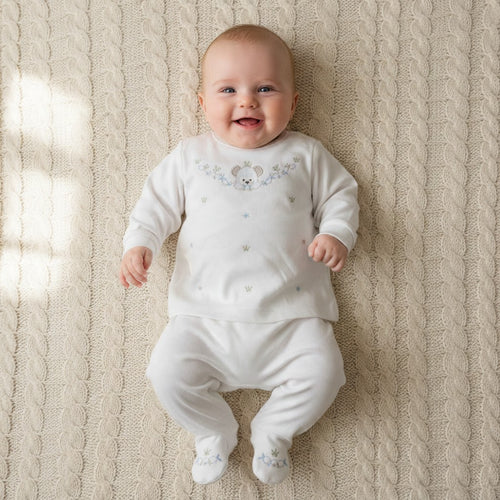 Baby wearing white embroidered teddy 2-piece set