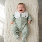 Velvet Footed Baby Sleepsuit with Embroidered Collar – Sage Green / Teddy – styled on baby