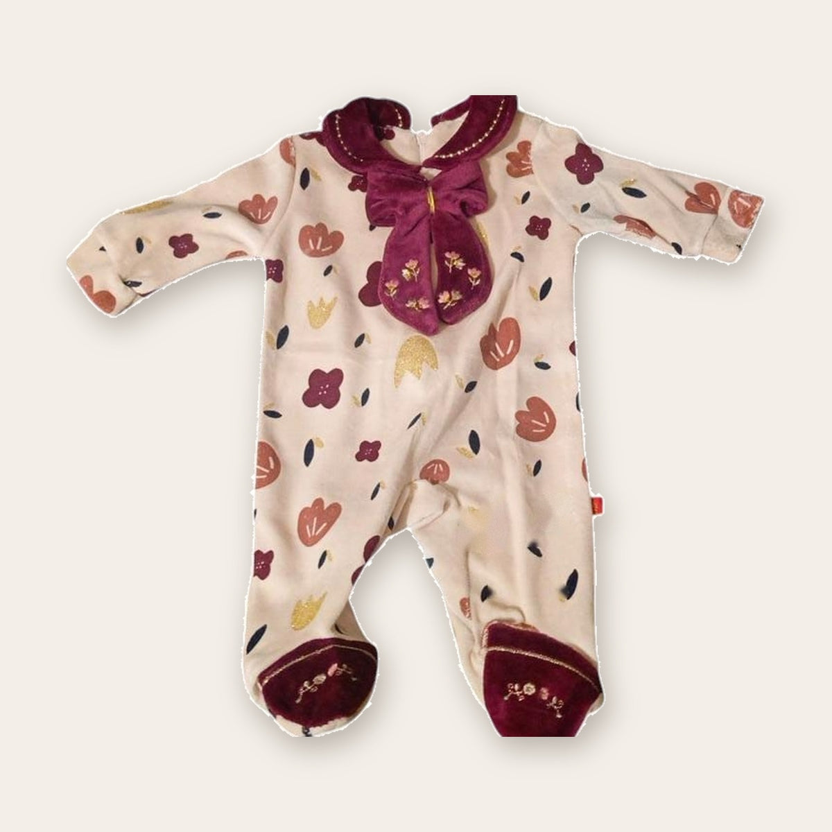 Floral Velvet Footed Baby Sleepsuit with Bow – Cream / Burgundy – front, styled